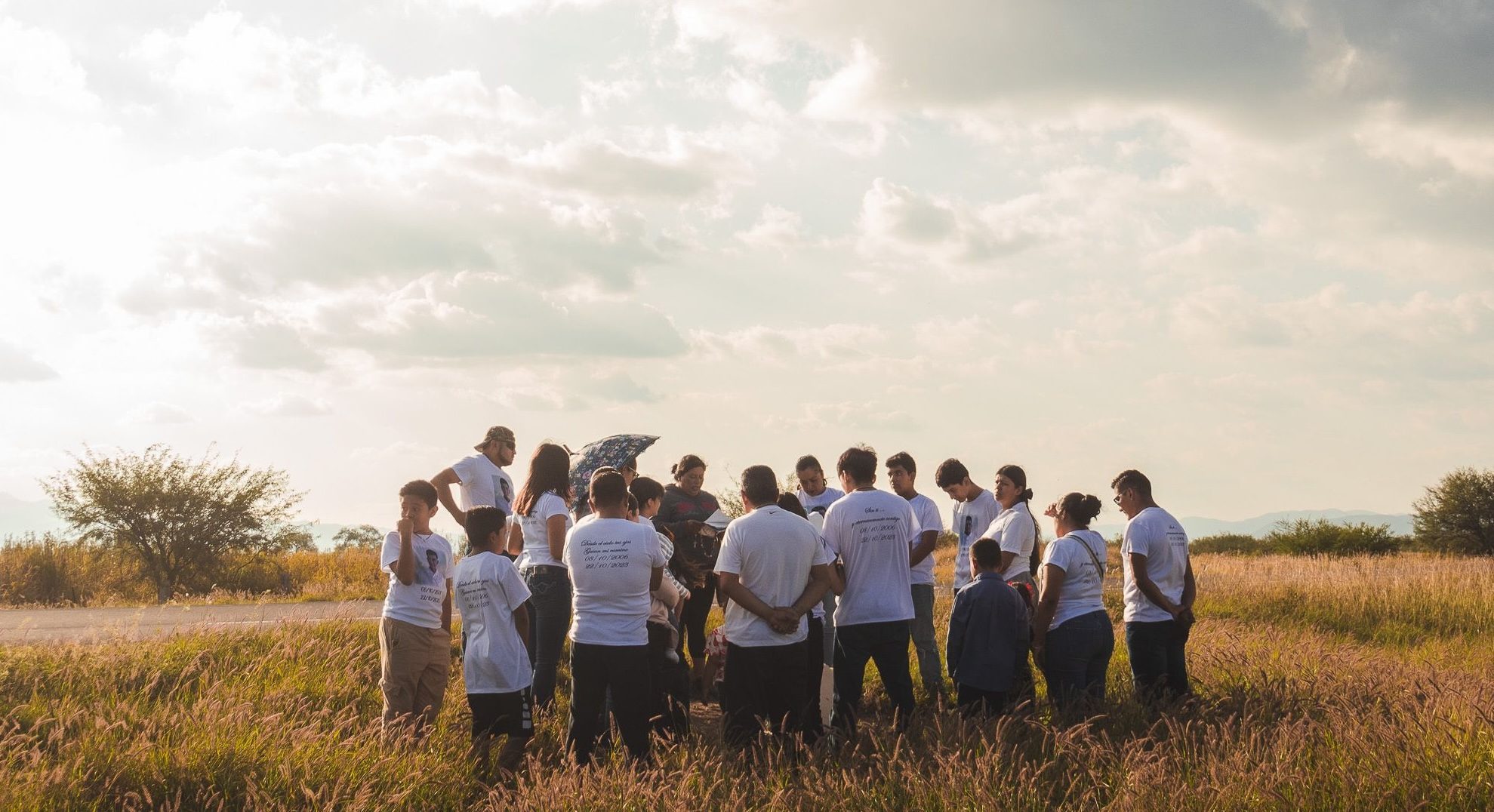 Financial Issues partners gathered together in a field